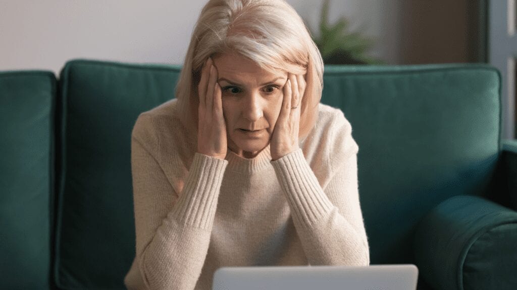 An older woman stressed with DIY estate planning